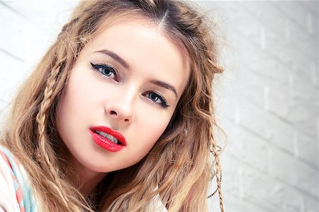 simsearch:400-08430017,k - Boho Girl Close-Up Portrait at White Brick Wall Background. Bohemian Fashion Woman Portrait. Toned Photo with Copy Space. Stock Photo - Budget Royalty-Free & Subscription, Code: 400-08553165