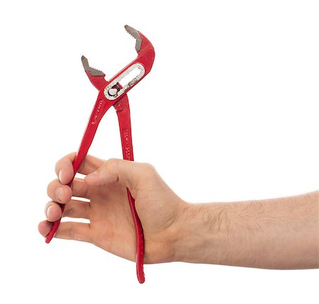 simsearch:400-09113563,k - Hand of male plumber with a red wrench, isolated Stock Photo - Budget Royalty-Free & Subscription, Code: 400-08574262