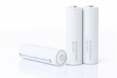 Close up white AA batteries over white background Stock Photo - Budget Royalty-Free & Subscription, Code: 400-08574610