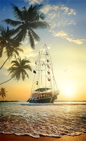 simsearch:400-06064328,k - Beautiful ship in ocean near coast with palm trees Stockbilder - Microstock & Abonnement, Bildnummer: 400-08574929