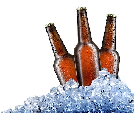 simsearch:400-05260769,k - Brown bottles of beer in ice cubes isolated on white Foto de stock - Royalty-Free Super Valor e Assinatura, Número: 400-08575313