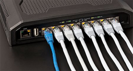 ethernet cords - Managed switch with 10 power over ethernet gigabit ports on black background Stock Photo - Budget Royalty-Free & Subscription, Code: 400-08575323