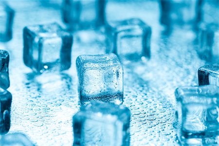 fresh glass of ice water - Many blue melting ice cubes on glass Stock Photo - Budget Royalty-Free & Subscription, Code: 400-08575954