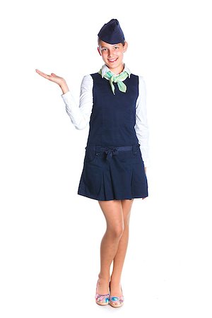 Charming Girl Stewardess Dressed In Blue Uniform On White Background Stock Photo - Budget Royalty-Free & Subscription, Code: 400-08576027