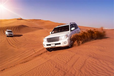 Desert Safari SUVs bashing through the arabian sand dunes Photographie de stock - Aubaine LD & Abonnement, Code: 400-08572928