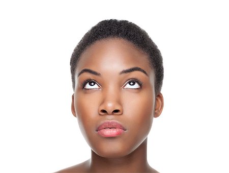 Beautiful young black woman looking up Foto de stock - Super Valor sin royalties y Suscripción, Código: 400-08572997