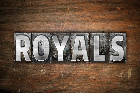 The word "Royals" written in vintage metal letterpress type on an aged wooden background. Stock Photo - Budget Royalty-Free & Subscription, Code: 400-08573074