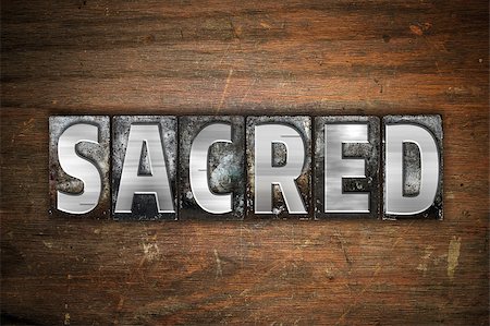 pious - The word "Sacred" written in vintage metal letterpress type on an aged wooden background. Stock Photo - Budget Royalty-Free & Subscription, Code: 400-08573088