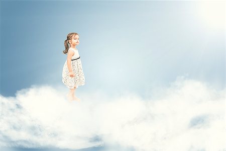 Cute little girl standing barefoot on  clouds Foto de stock - Royalty-Free Super Valor e Assinatura, Número: 400-08573160