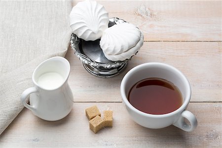 simsearch:659-03533716,k - Set of cup black tea and dessert on bright wooden table Stock Photo - Budget Royalty-Free & Subscription, Code: 400-08573229