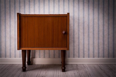 vintage style piece of furniture on a wooden floor and striped wall Stock Photo - Budget Royalty-Free & Subscription, Code: 400-08573283