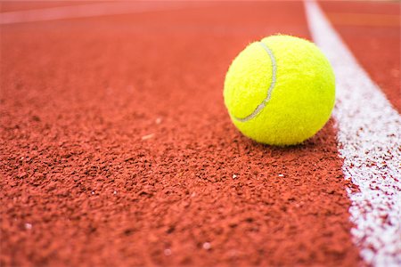 Tennis ball on a stadium Stock Photo - Budget Royalty-Free & Subscription, Code: 400-08614397