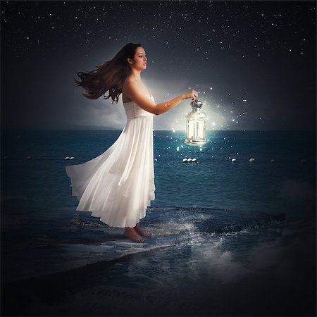 simsearch:400-05252253,k - Woman walks at night with a lantern Stockbilder - Microstock & Abonnement, Bildnummer: 400-08614805
