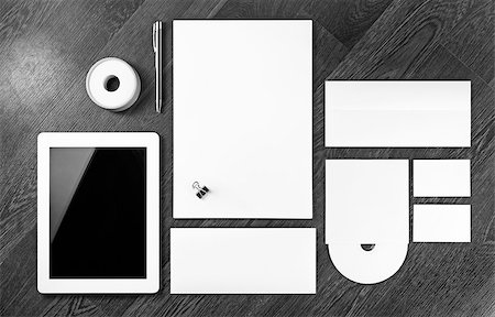 Blank stationery set. Corporate identity template on wooden background. For design presentations and portfolios. Black and white image. Stock Photo - Budget Royalty-Free & Subscription, Code: 400-08615433