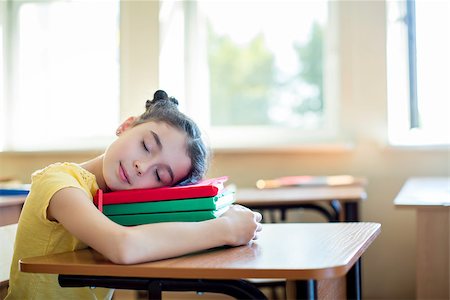 school class room sleeping girl - Sleeping pupil with book in classroom Stock Photo - Budget Royalty-Free & Subscription, Code: 400-08616072