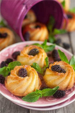 simsearch:400-06698338,k - Sweet cakes served with mint leaves and black mulberry Stock Photo - Budget Royalty-Free & Subscription, Code: 400-08617480