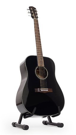 Black acoustic guitar on stand, isolated on a white background Stock Photo - Budget Royalty-Free & Subscription, Code: 400-08617515