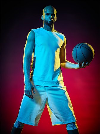 sports basketball portrait black background - one basketball player man Isolated on black background Stock Photo - Budget Royalty-Free & Subscription, Code: 400-08618872