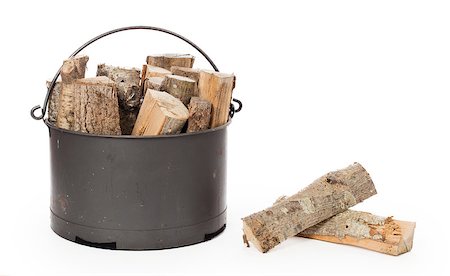 simsearch:400-06797086,k - Metal basket of firewood, isolated on white Stock Photo - Budget Royalty-Free & Subscription, Code: 400-08619240