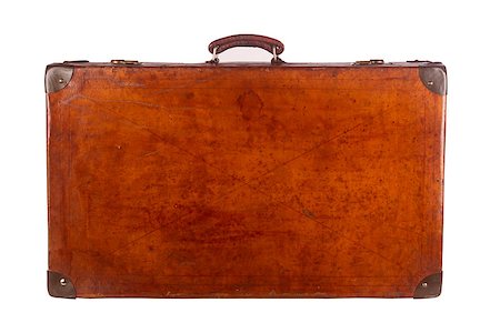 Old closed vintage suitcase viewed from the front isolated on white background Stock Photo - Budget Royalty-Free & Subscription, Code: 400-08625727