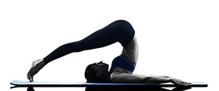 simsearch:400-05112689,k - one caucasian woman exercising pilates exercises fitness in silhouette isolated on white backgound Foto de stock - Super Valor sin royalties y Suscripción, Código: 400-08626508