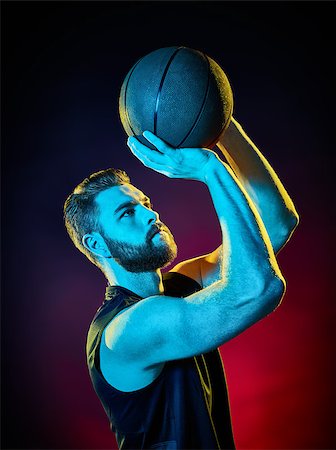 sports basketball portrait black background - one basketball player man Isolated on black background Stock Photo - Budget Royalty-Free & Subscription, Code: 400-08626501