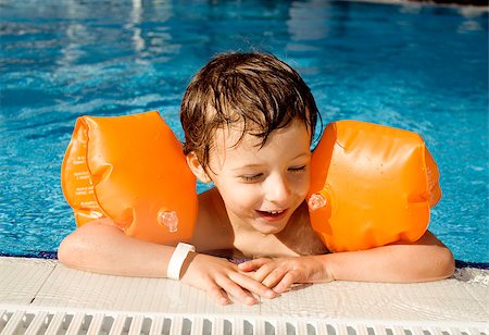 little cute  boy in swimming pool close up smiling, vacations in Turkey Stock Photo - Budget Royalty-Free & Subscription, Code: 400-08626749