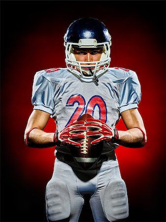 simsearch:400-08787080,k - one american football player man isolated on colorful black background Foto de stock - Super Valor sin royalties y Suscripción, Código: 400-08627564