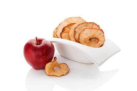 stacked apple slices - Dry and fresh apples isolated on white background. Healthy snack eating. Stock Photo - Budget Royalty-Free & Subscription, Code: 400-08628726