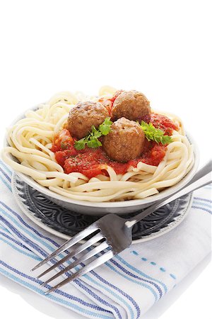 Pasta with tomato sauce and meatballs. Traditional mediterranean eating. Stock Photo - Budget Royalty-Free & Subscription, Code: 400-08629489