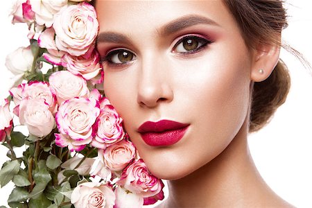 red lipstick art - Portrait of young beautiful woman with stylish make-up and colorful roses around her face Stock Photo - Budget Royalty-Free & Subscription, Code: 400-08629701