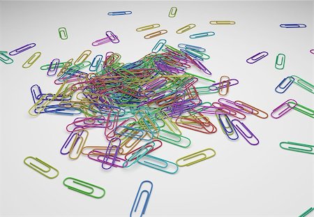 simsearch:400-04892145,k - Color paperclips for paper documents on white desk. Rotation of the paperclip. 3D illustration. Stock Photo - Budget Royalty-Free & Subscription, Code: 400-08629996
