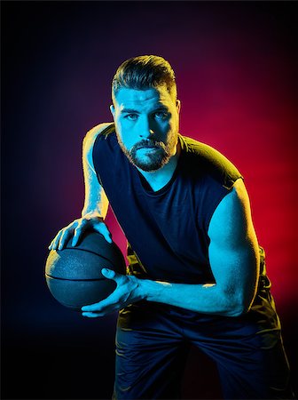 sports basketball portrait black background - one basketball player man Isolated on black background Stock Photo - Budget Royalty-Free & Subscription, Code: 400-08620323
