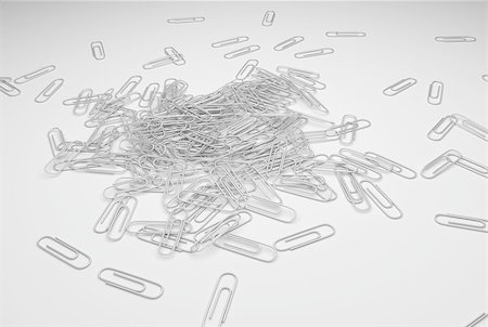 simsearch:400-05215797,k - Paperclips for paper documents on white desk. Rotation of the paperclip. 3D illustration. Foto de stock - Super Valor sin royalties y Suscripción, Código: 400-08620439