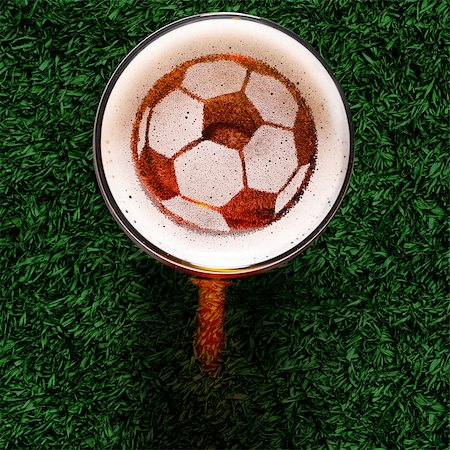 pint mug silhouette - soccer or football ball symbol on foam of fresh lager beer glass on grass, view from above Stock Photo - Budget Royalty-Free & Subscription, Code: 400-08620956