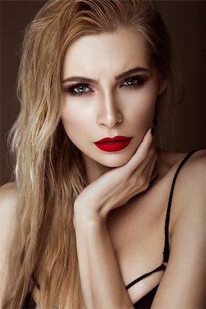 Beautiful sexy blonde girl with sensual lips, fashion hair, black art nails. Beauty face. Photo shot in studio Photographie de stock - Aubaine LD & Abonnement, Code: 400-08621731