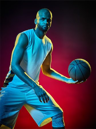 sports basketball portrait black background - one basketball player man Isolated on black background Stock Photo - Budget Royalty-Free & Subscription, Code: 400-08623056