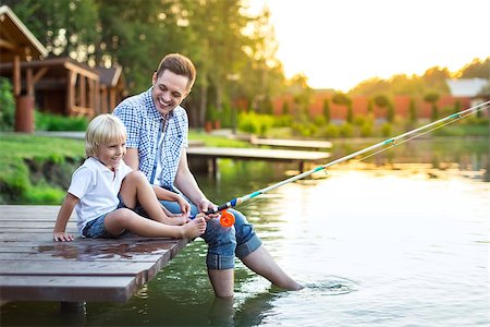 father and son fishing dock lake - Dad and son fishing in summer Stock Photo - Budget Royalty-Free & Subscription, Code: 400-08623576
