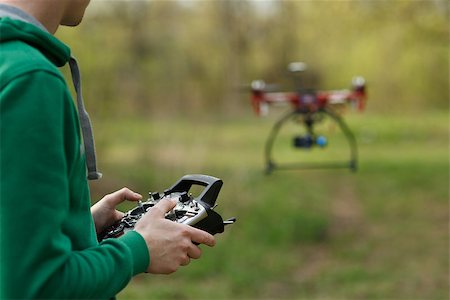 Man controling a drone. Stock Photo - Budget Royalty-Free & Subscription, Code: 400-08623876