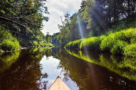 The forest river in the sun light, first-person from kayak Luchosa, Belarus. Stockbilder - Microstock & Abonnement, Bildnummer: 400-08652298