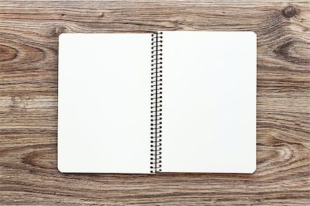 Mockup of open notepad with blank pages on wooden background. Template for your design. Top view. Photographie de stock - Aubaine LD & Abonnement, Code: 400-08669119