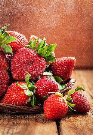 simsearch:400-08251879,k - Fresh organic ripe wet strawberry on wooden table with water splash around Stock Photo - Budget Royalty-Free & Subscription, Code: 400-08669469