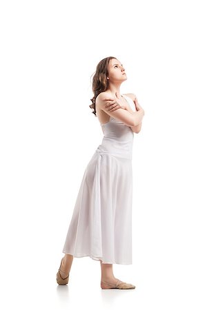 Young woman dancing in gorgeous white dress over white Stock Photo - Budget Royalty-Free & Subscription, Code: 400-08669758