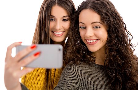 friends taking a selfie - Teen girls with smartphone taking selfie Stock Photo - Budget Royalty-Free & Subscription, Code: 400-08669803
