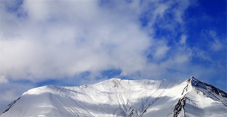 simsearch:400-08530488,k - Panoramic view on off-piste snowy slope in wind day. Caucasus Mountains, Georgia, region Gudauri. Stock Photo - Budget Royalty-Free & Subscription, Code: 400-08678169
