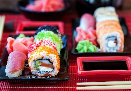 simsearch:400-04292843,k - Assorted of fresh delicious sushi and rolls on table, japanese food Stock Photo - Budget Royalty-Free & Subscription, Code: 400-08679007