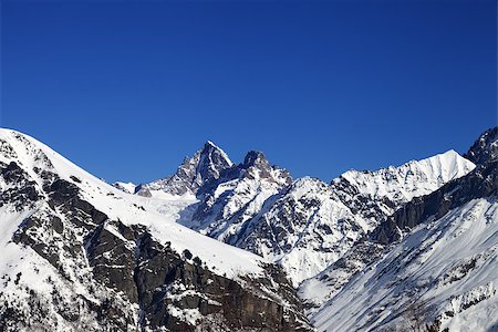 simsearch:400-08671175,k - Mountain peaks in winter at sunny day. Caucasus Mountains. Svaneti region of Georgia. Stock Photo - Budget Royalty-Free & Subscription, Code: 400-08679390