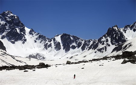 Hiker in snowy mountains. Turkey, Kachkar Mountains in spring (highest part of Pontic Mountains). Stock Photo - Budget Royalty-Free & Subscription, Code: 400-08673302