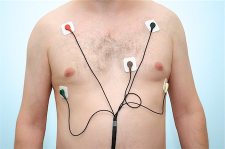 A man wearing holter monitor device Stock Photo - Budget Royalty-Free & Subscription, Code: 400-08680632