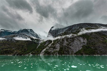 endicott arm - Icy green water of the Endicott Arm Fjord near Juneau in Alaska under dark clouds Stock Photo - Budget Royalty-Free & Subscription, Code: 400-08694339
